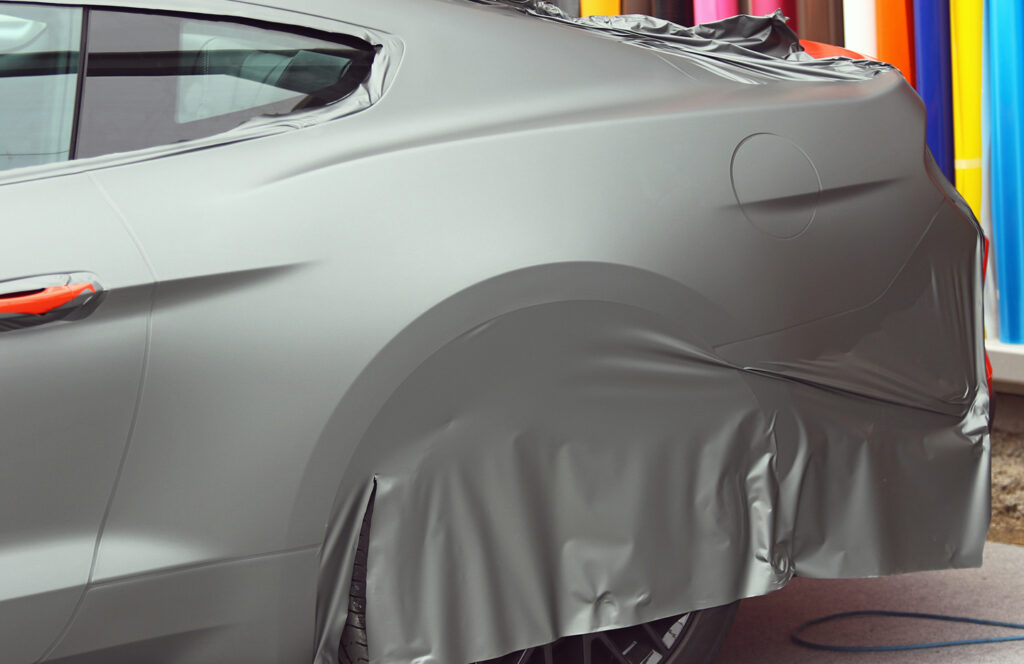 Vehicle masked and prepared for paintwork